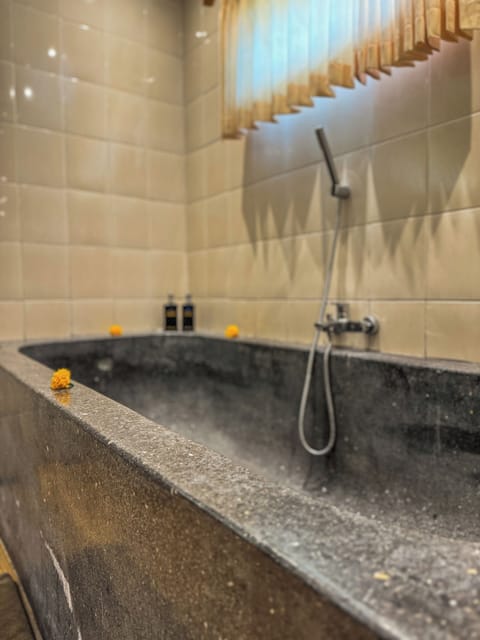 Joglo Room | Bathroom | Combined shower/tub, slippers, bidet, towels