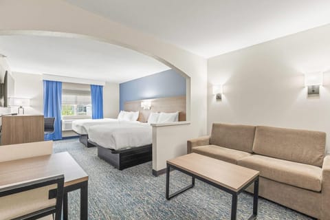 Standard Room, 2 Queen Beds, Non Smoking | In-room safe, laptop workspace, blackout drapes, iron/ironing board