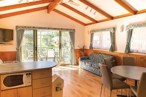 Deluxe Villa, 2 Bedrooms | Living area | 32-inch flat-screen TV with digital channels, TV, DVD player