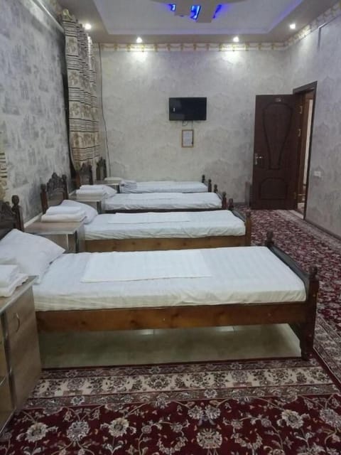 Luxury Quadruple Room | In-room safe, bed sheets