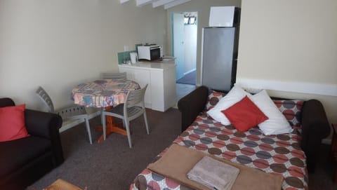 Comfort Loft | Living area | Flat-screen TV