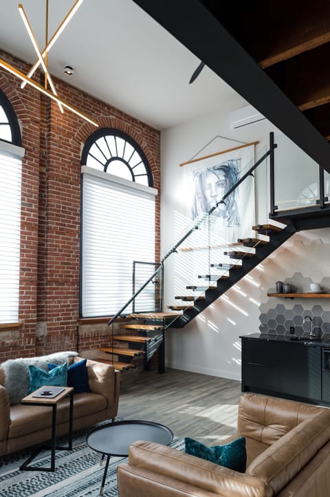 The Metro Suite | Living room | 42-inch Smart TV with digital channels, TV, fireplace