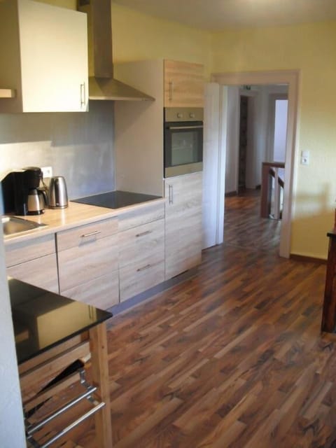 Apartment, 4 Bedrooms | Private kitchen | Fridge, oven, stovetop, coffee/tea maker