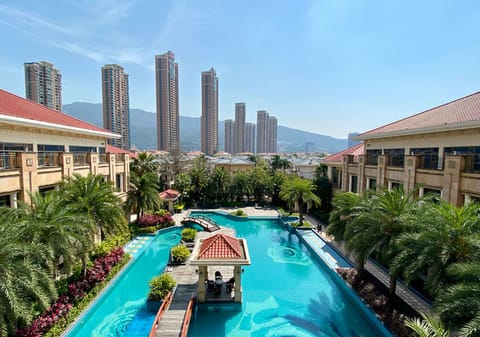 Outdoor pool, open 8:00 AM to 9:00 PM, pool umbrellas