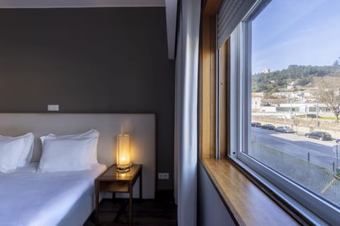 Hypo-allergenic bedding, pillowtop beds, minibar, in-room safe