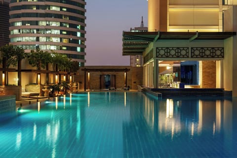 Outdoor pool, open 7:00 AM to 9:00 PM, free cabanas, pool umbrellas