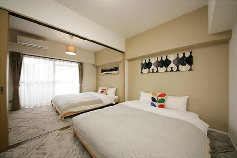 Family Room, 2 Queen Beds, Non Smoking, Kitchen (2 Queen Beds) | Desk, laptop workspace, blackout drapes, iron/ironing board