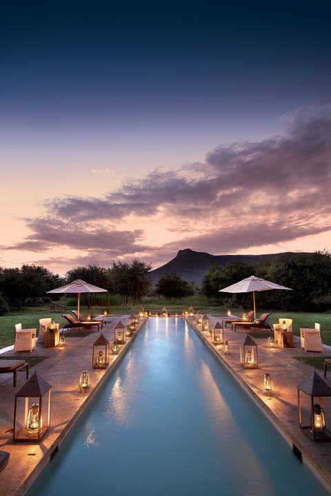 Outdoor pool, pool umbrellas, sun loungers
