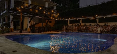 Outdoor pool, open 8:00 AM to 10:00 PM, sun loungers