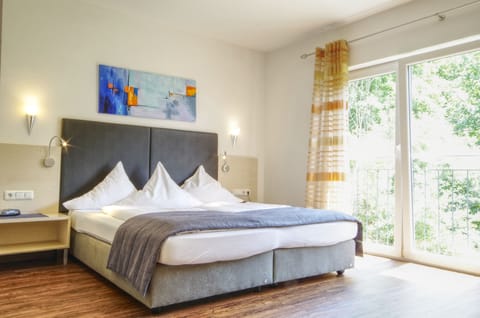 Superior Double Room | Hypo-allergenic bedding available, minibar, desk, laptop workspace