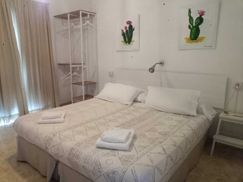 Double Room | 1 bedroom, down comforters, blackout drapes, iron/ironing board