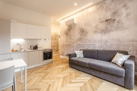 Apartment, 1 Bedroom | Living area | Flat-screen TV