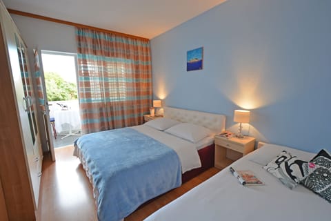 Comfort Room, 1 Bedroom, Kitchenette | Individually decorated, individually furnished, blackout drapes