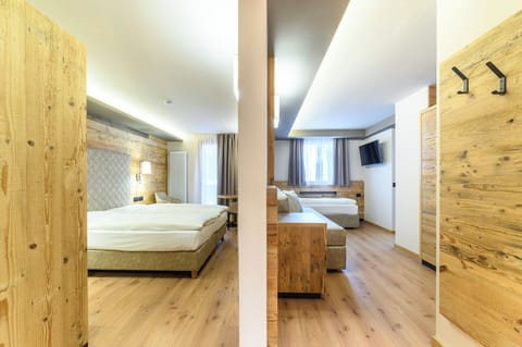 Family Room, 2 Bedrooms (3 Pax) | Minibar, in-room safe, desk, free WiFi