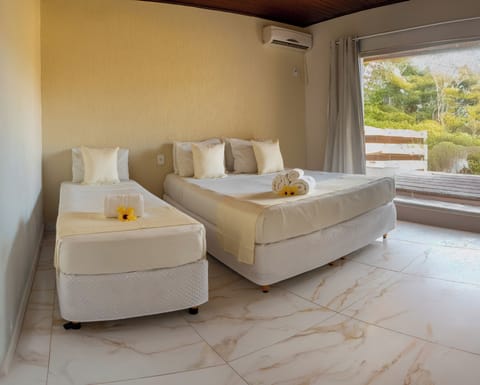 Standard Room | Minibar, in-room safe, blackout drapes, free cribs/infant beds