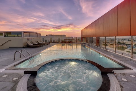 Outdoor pool, open 8:00 AM to 8:00 PM, pool umbrellas, sun loungers