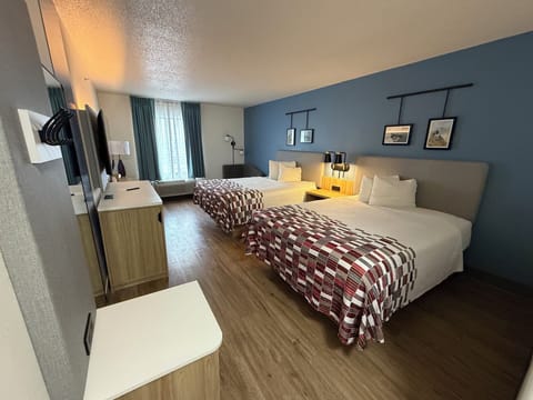 Deluxe Room, 2 Queen Beds, Non Smoking | Desk, blackout drapes, iron/ironing board, free WiFi