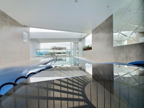 Indoor pool, open 6:00 AM to 10:00 PM, sun loungers