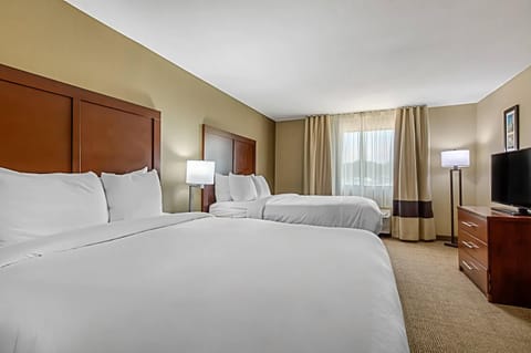 Premium bedding, pillowtop beds, desk, blackout drapes