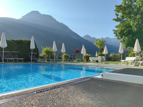 Indoor pool, outdoor pool, open 7:30 AM to 8:00 PM, pool umbrellas