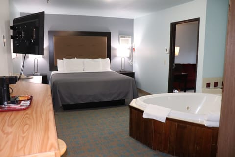 Deluxe Room, 1 King Bed (No Pets Allowed) | Desk, iron/ironing board, free WiFi, bed sheets