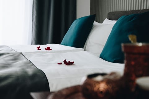 Desk, blackout drapes, iron/ironing board, free cribs/infant beds