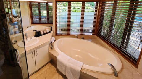 Premium Double Room, 1 King Bed, Pool Access, Garden Area | Deep soaking bathtub