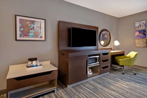 Desk, laptop workspace, blackout drapes, iron/ironing board