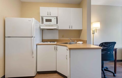 Studio, 1 Queen Bed, Non Smoking | Private kitchen | Full-size fridge, microwave, stovetop, coffee/tea maker