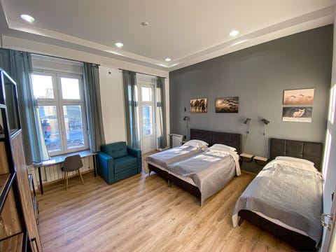 Quadruple Room, Shared Bathroom | Individually decorated, individually furnished, desk, laptop workspace