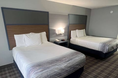 Room, 2 Queen Beds, Non Smoking | Pillowtop beds, desk, laptop workspace, blackout drapes