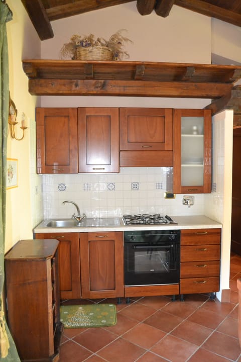 Standard Quadruple Room | Private kitchen | Fridge, coffee/tea maker