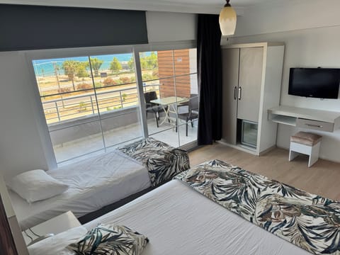 Superior Double Room, Beach View | In-room safe, desk, blackout drapes, iron/ironing board (on request)