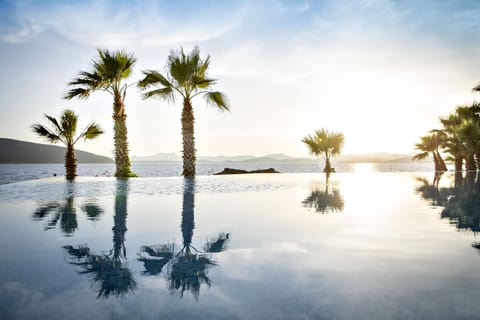 Indoor pool, seasonal outdoor pool, pool umbrellas, sun loungers