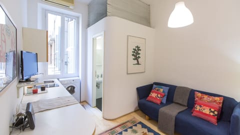 Apartment, 1 Bedroom | Living area | Flat-screen TV