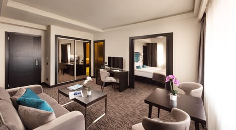 Superior Suite, City View | Living area | 105-cm Smart TV with satellite channels, TV