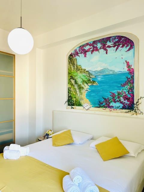 Family Apartment, Balcony, Sea View (3 persone) | Minibar, iron/ironing board, free WiFi, bed sheets