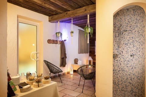 Sauna, hot tub, steam room, body treatments, hot stone massages