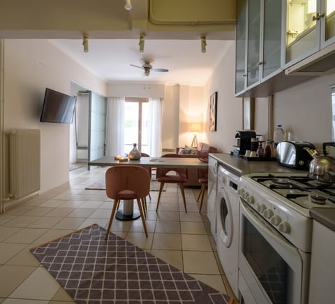 Exclusive Apartment, 1 Bedroom | Private kitchen | Full-size fridge, oven, stovetop, coffee/tea maker