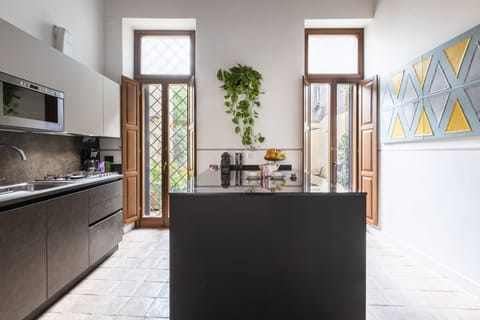 Apartment, Multiple Bedrooms (21 people) | Private kitchen | Full-size fridge, microwave, stovetop, highchair