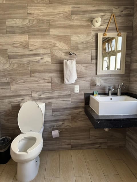 Basic Double Room | Bathroom | Shower, towels, soap, shampoo