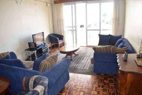 Apartment, 2 Bedrooms | Living area | 32-inch flat-screen TV with satellite channels, TV