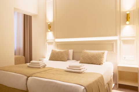 Standard Triple Room, Courtyard View | In-room safe, soundproofing, free WiFi, bed sheets