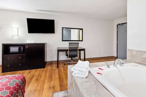 Suite, 1 King Bed, Non Smoking | In-room safe, desk, blackout drapes, rollaway beds