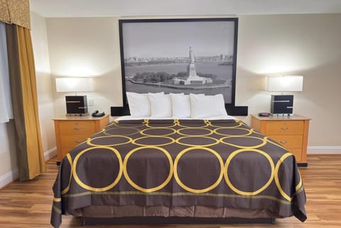 Desk, blackout drapes, iron/ironing board, rollaway beds