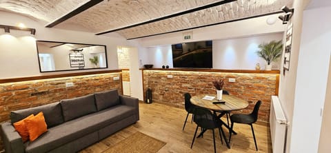 Deluxe Apartment | Living area | 123-cm Smart TV with digital channels, TV, Netflix
