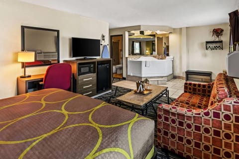 Suite, 1 King Bed, Hot Tub | In-room safe, desk, blackout drapes, cribs (free)