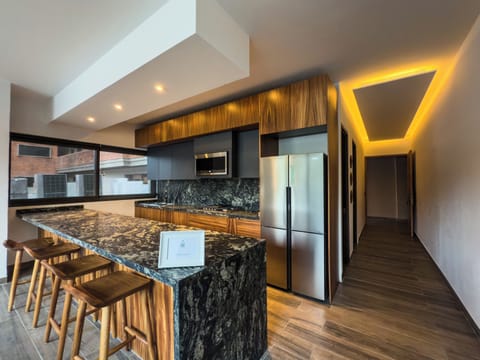 Luxury Studio Suite | Private kitchen | Espresso maker, cookware/dishes/utensils