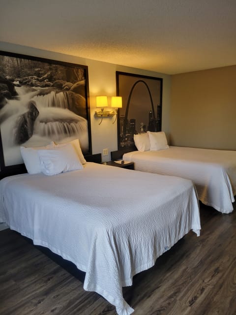 Standard Room, 2 Queen Beds | Blackout drapes, iron/ironing board, free cribs/infant beds