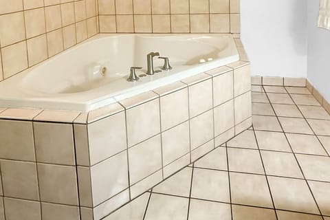 Deluxe Studio Suite, 1 King Bed, Non Smoking | Desk, iron/ironing board, free cribs/infant beds, rollaway beds